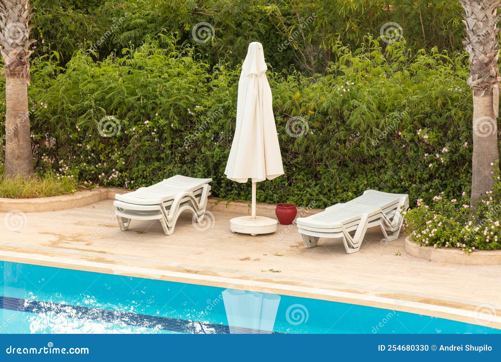 Sunbeds and Deck Chairs by the Pool. Stock Photo Image of hotel, deck