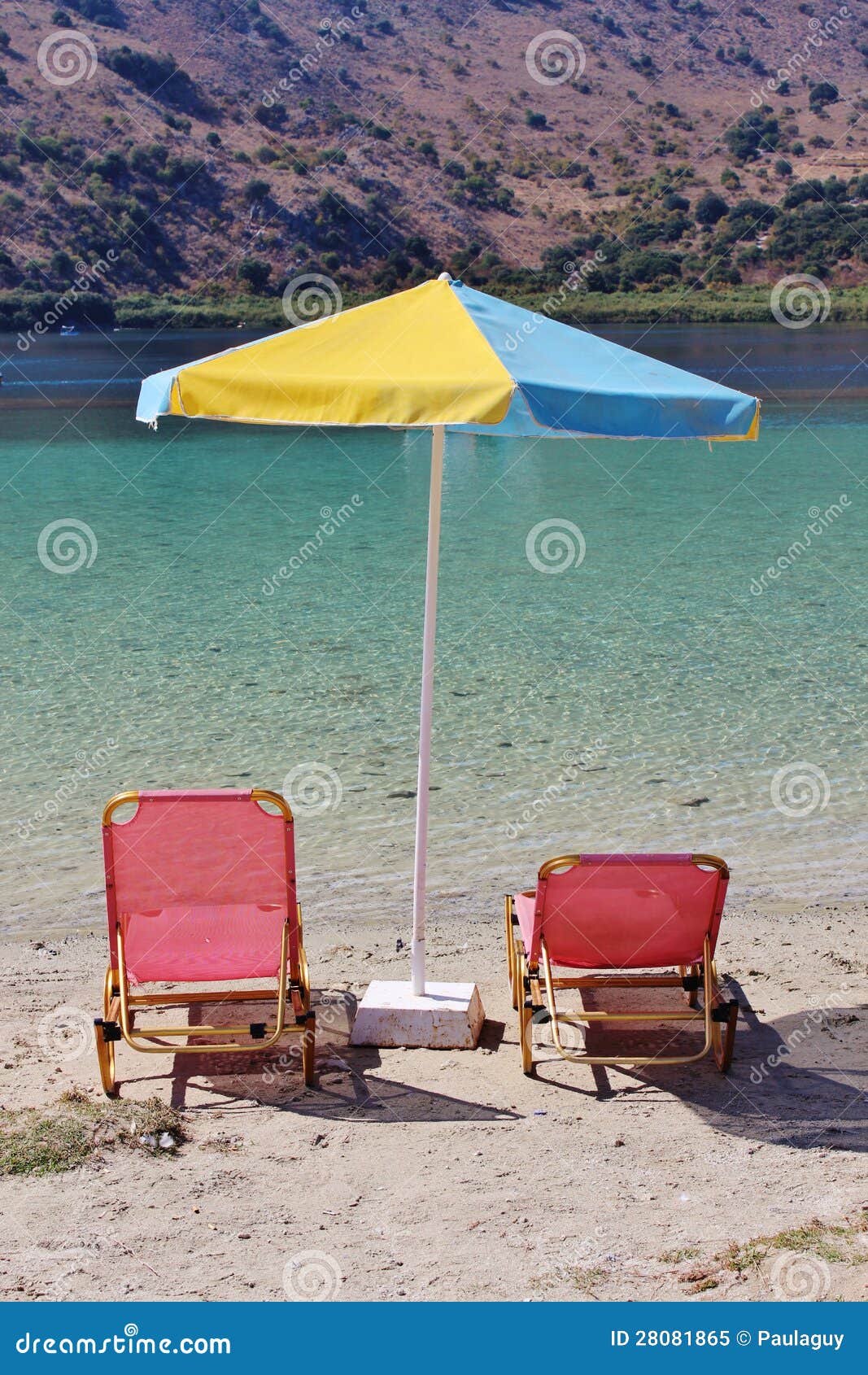 Sunbeds and Parasol stock image. Image of green, greece 28081865