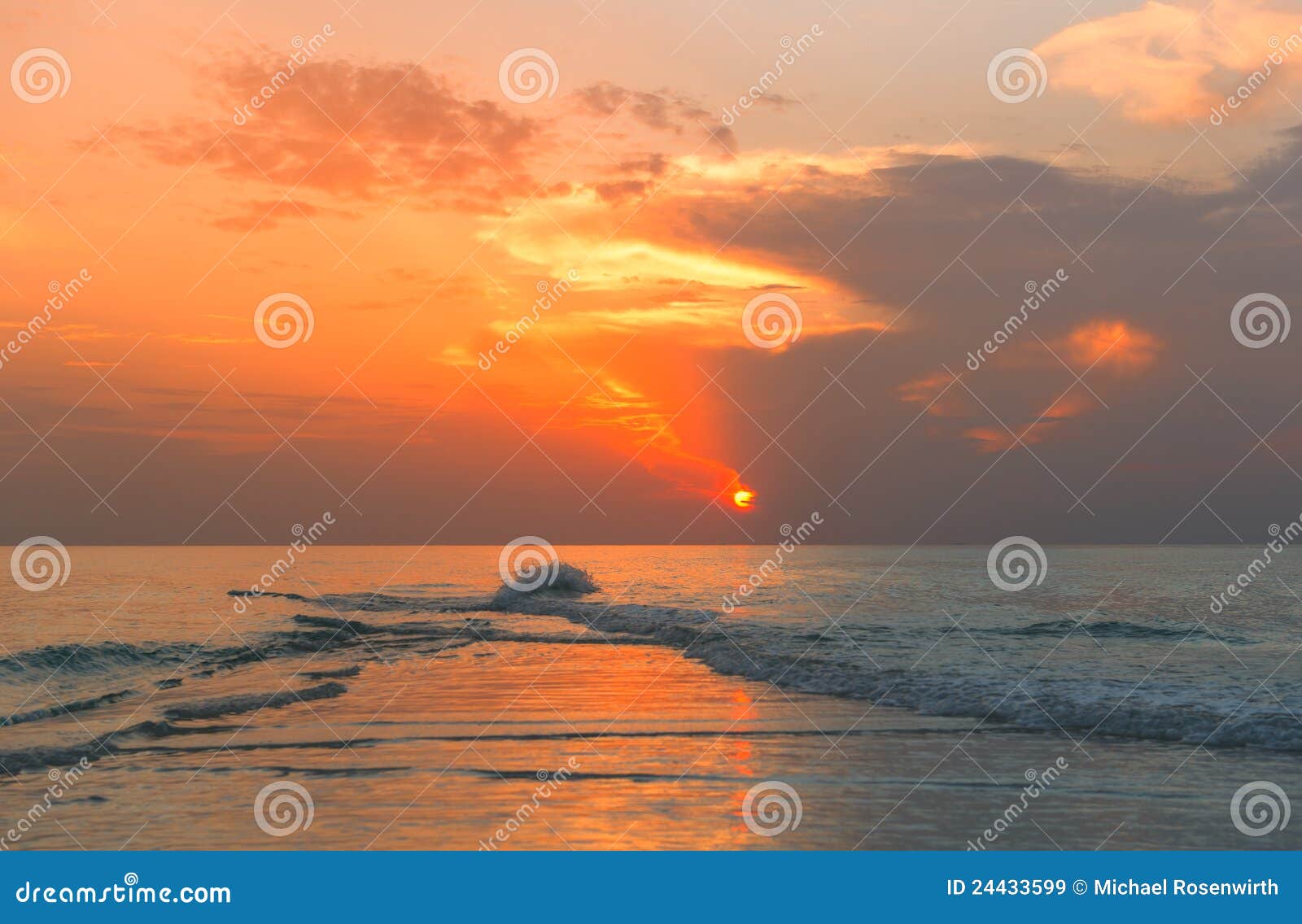 Sundown at the beach stock image. Image of reflection 24433599