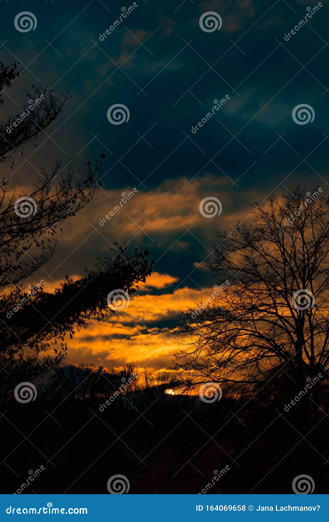 Sundown with a Dark Blue Clouds. Stock Photo Image of blue, dusk