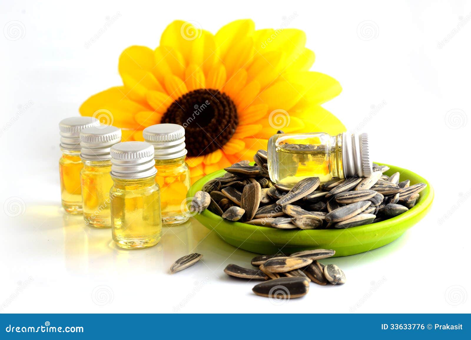 Sunflower Seed with Drop of Oil in the Bottle. Stock Photo Image of