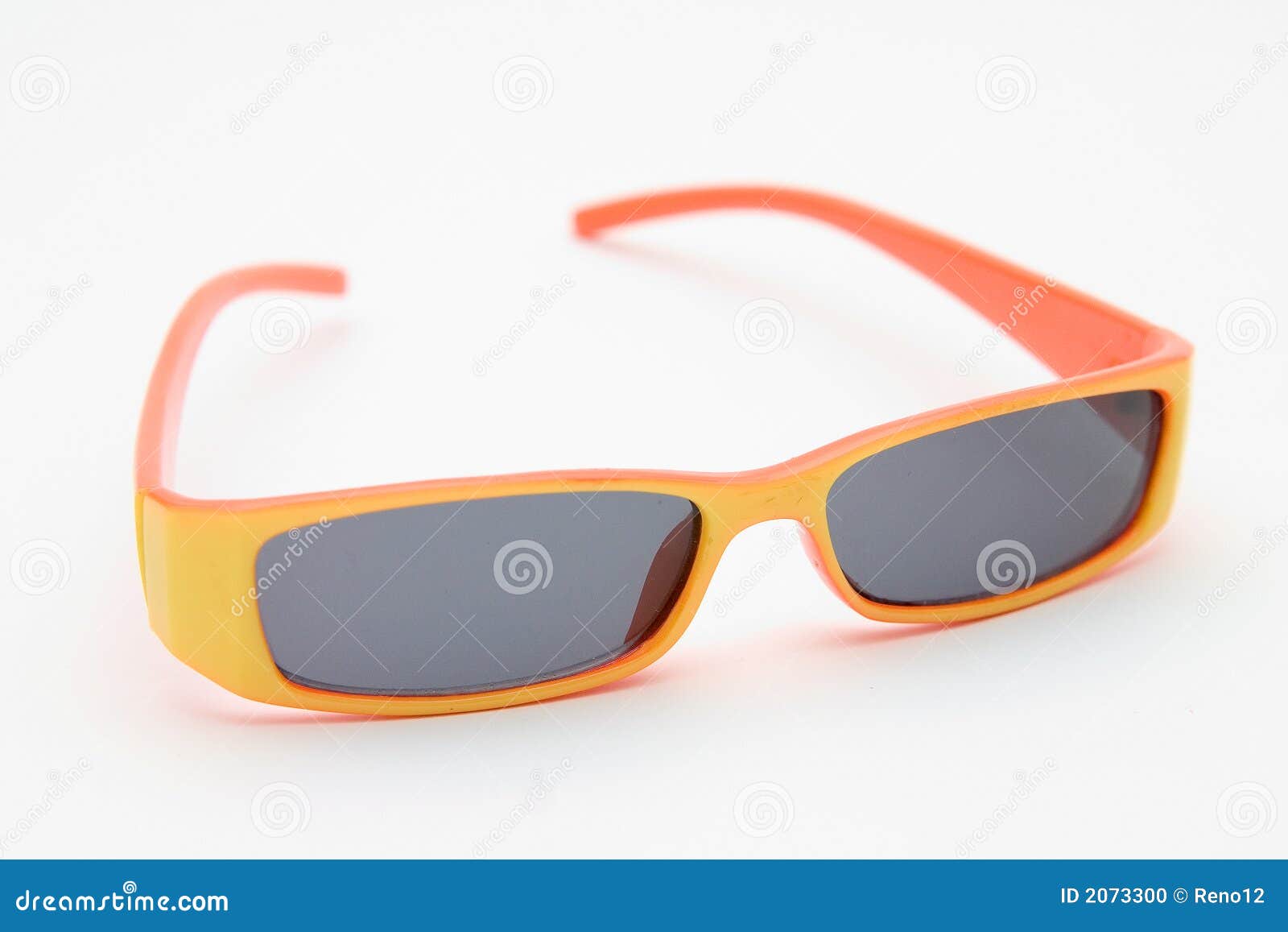 Orange child s sunglasses isolated on white background