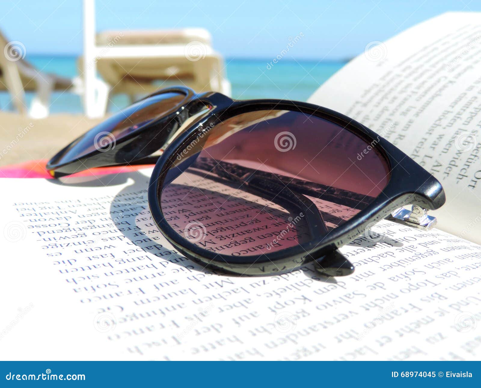 Sunglasses on the beach editorial image. Image of summer 68974045