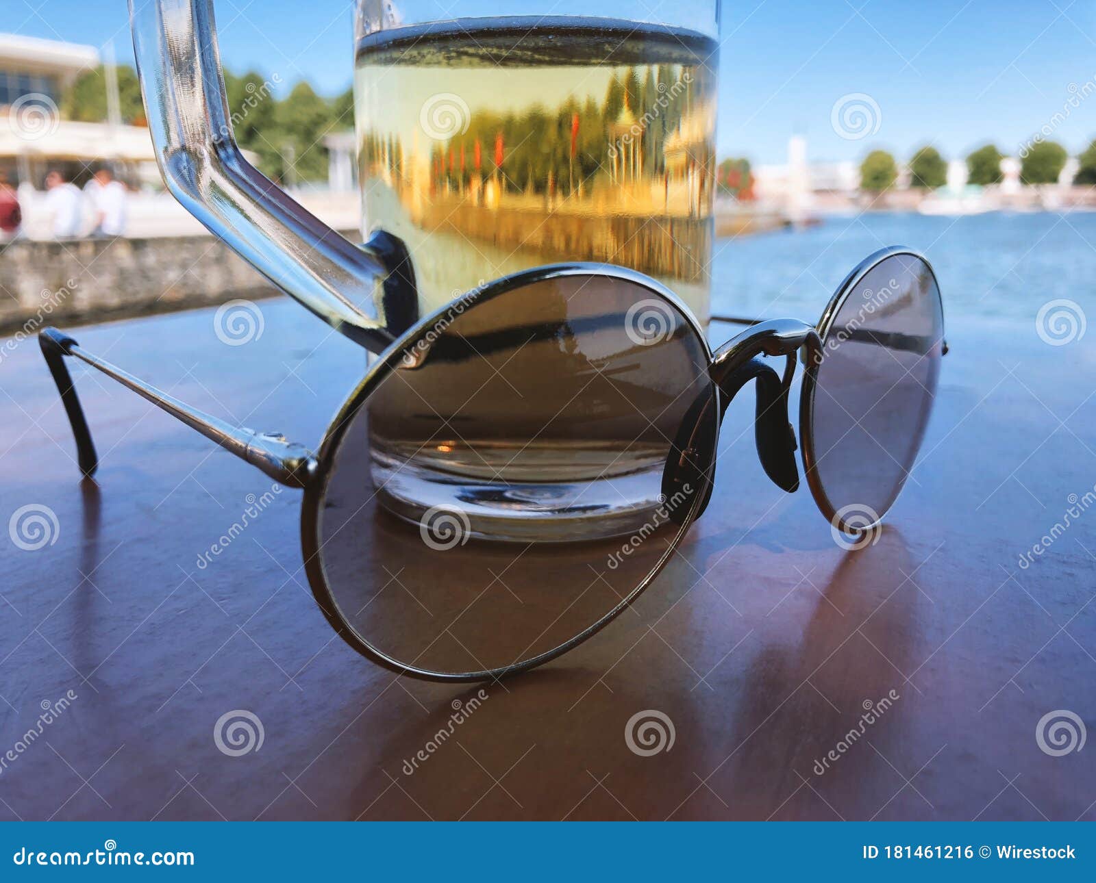 Sunglasses and a Cup of Beer on the Table Stock Photo Image of retro, flat 181461216