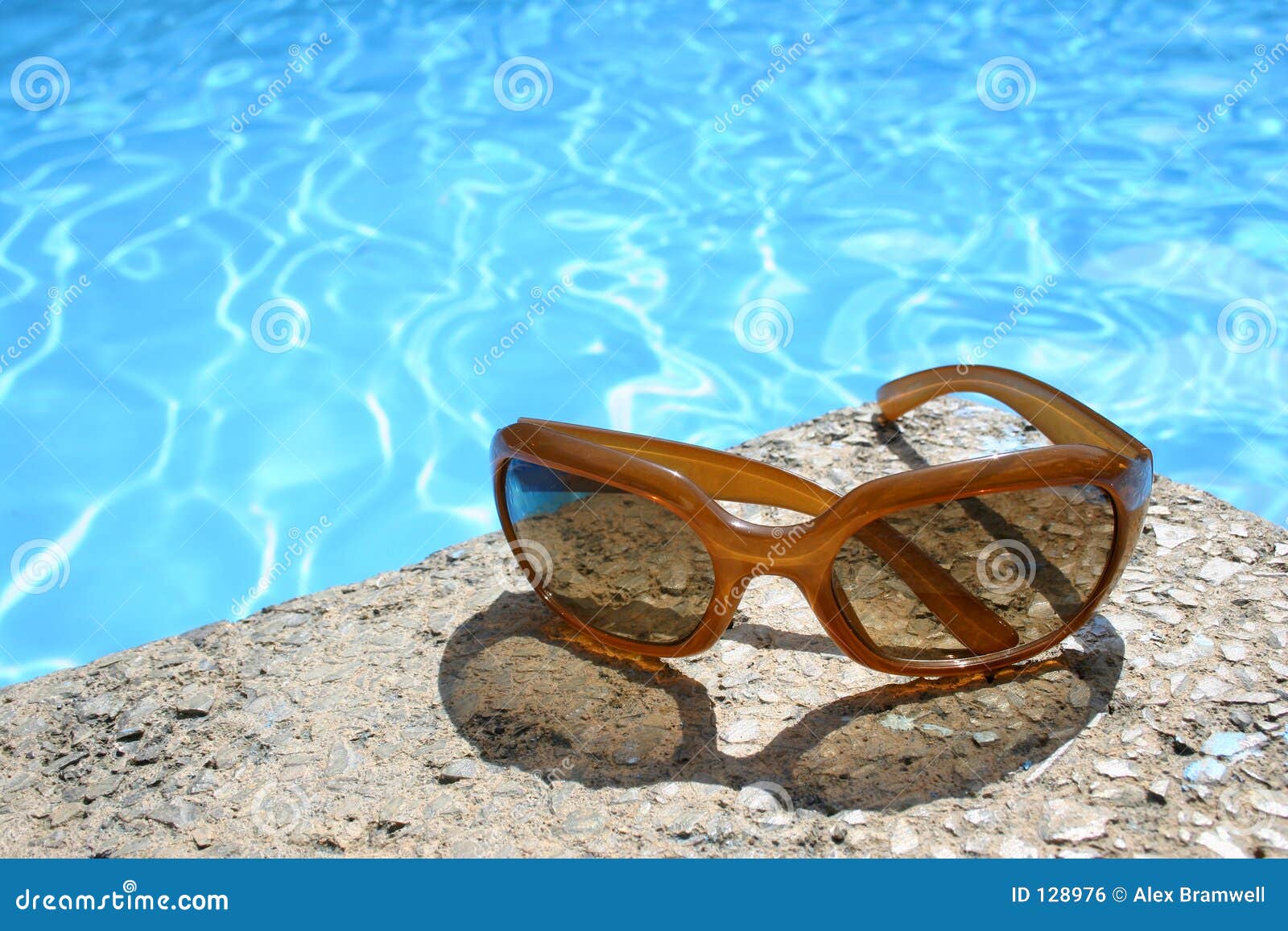 sunglasses by pool