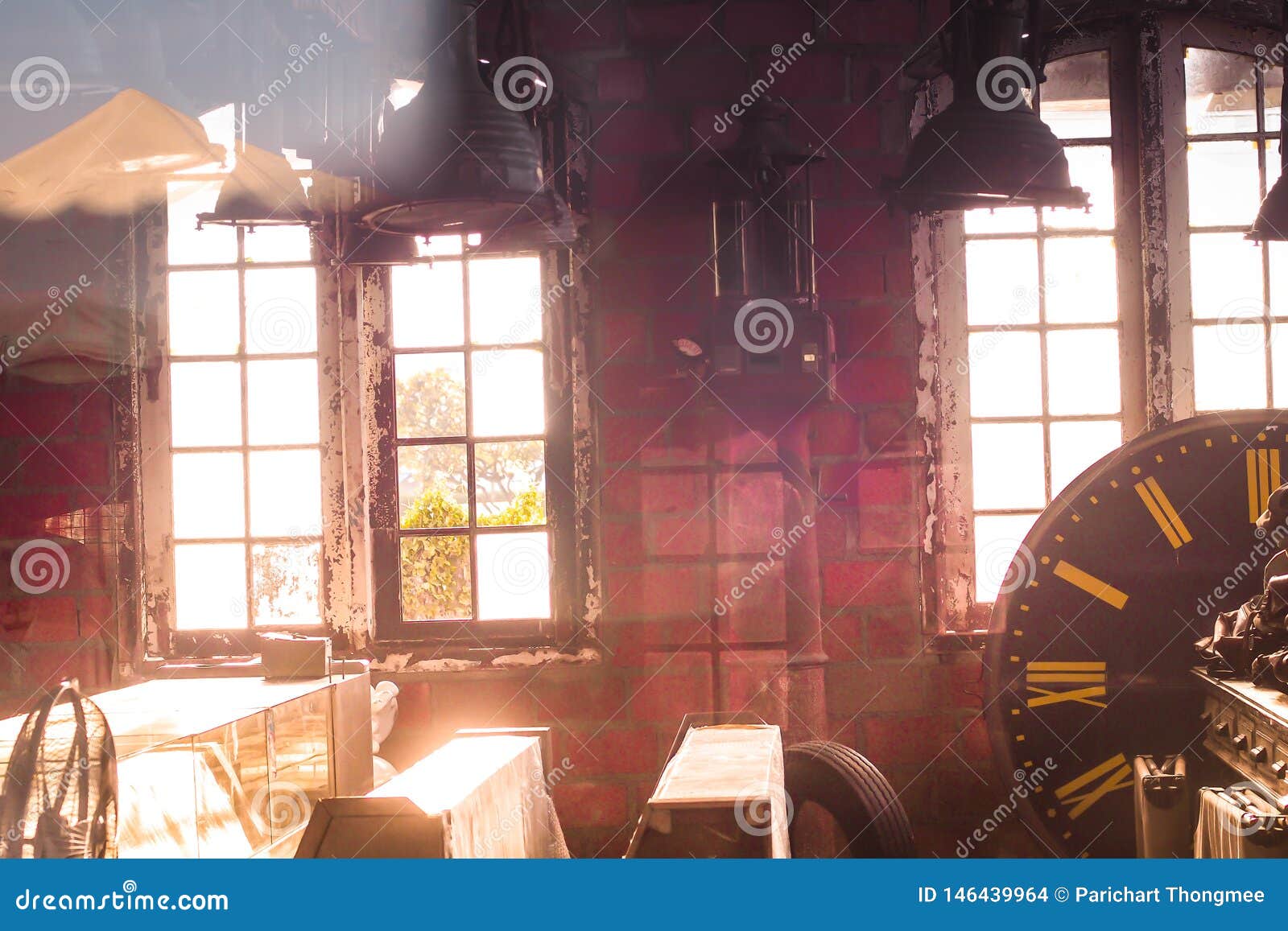 Sunlight Shining through the Windows of an Old Abandoned Industrial