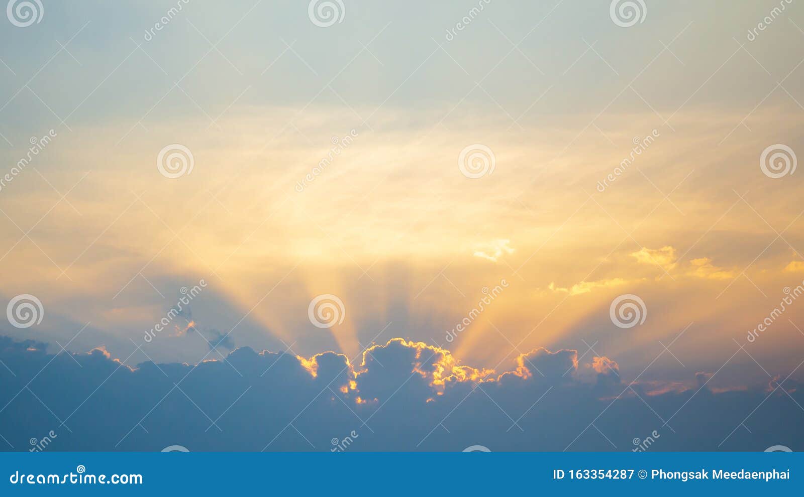 Stairway to Heaven in Cloudy Sky with Sunlight Rays Shining Down