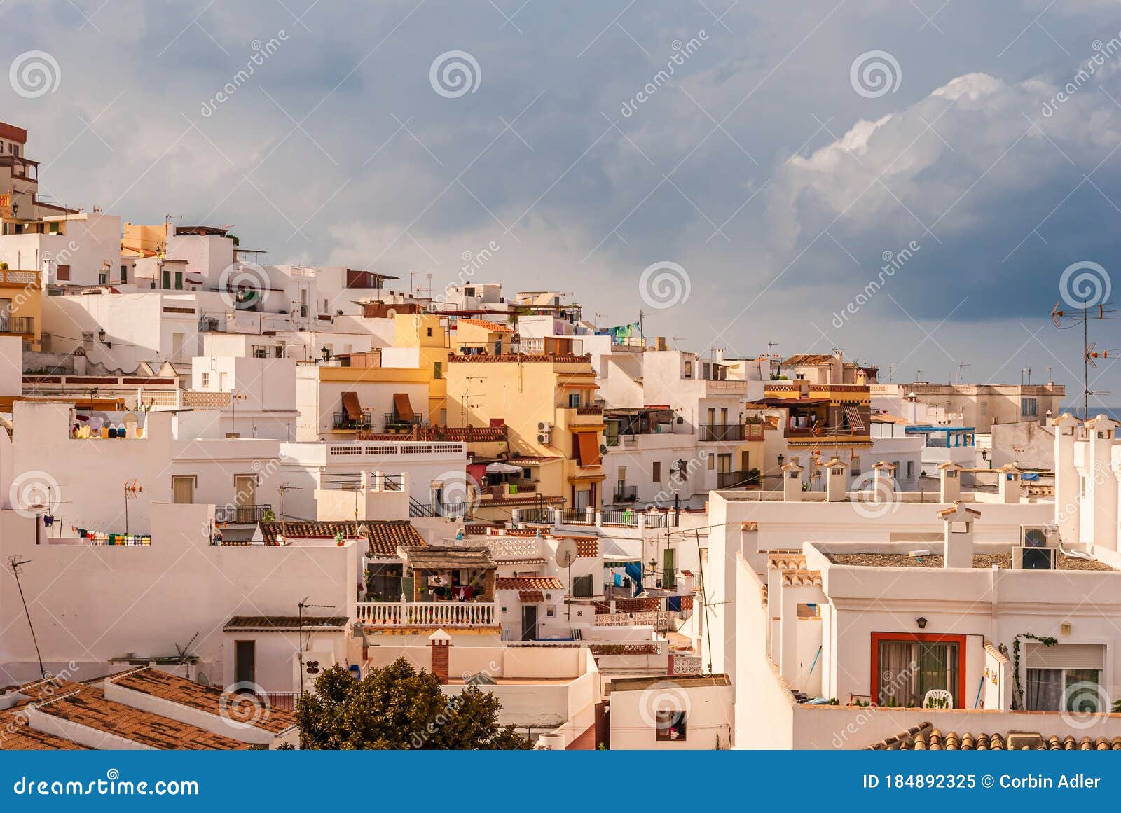sunlit houses and apartments in the costa tropical town of la herradura, granada, spain