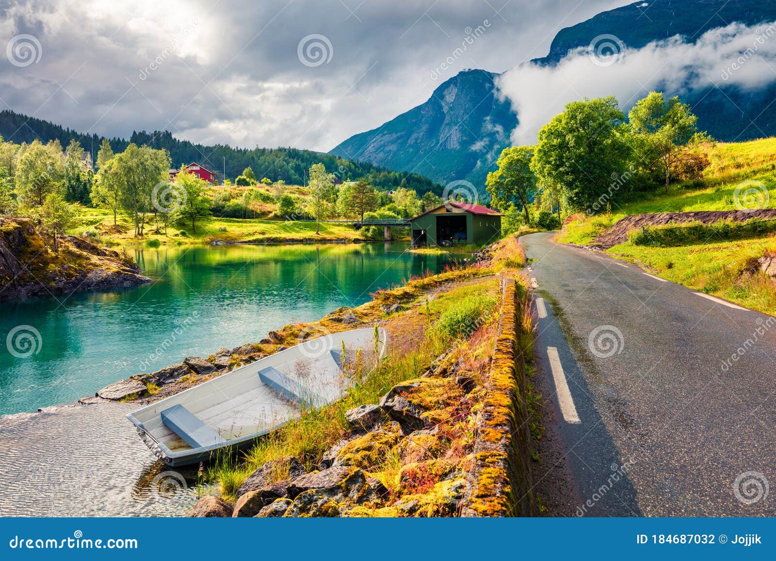 sunny summer view of lovatnet lake, municipality of stryn, sogn og fjordane county, norway. colorful morning scene in norway.