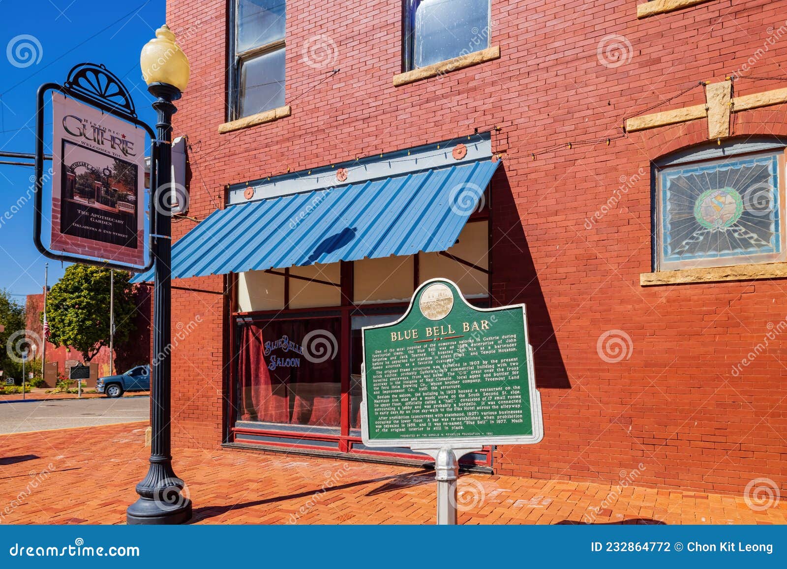 Sunny View of the Blue Bell Bar in Old Town of Guthrie Editorial
