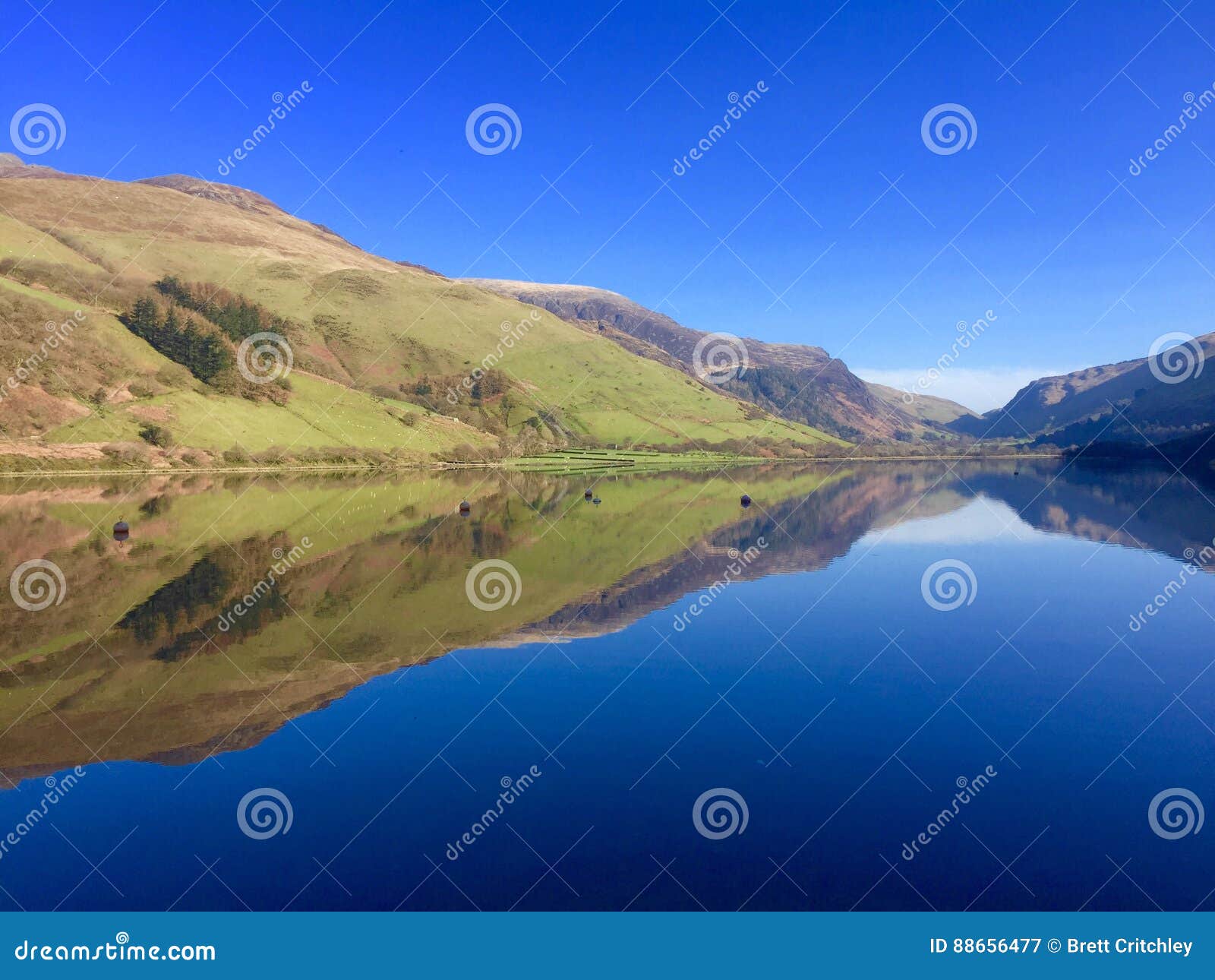 Sunny Welsh lake Wales stock image. Image of reflections - 88656477