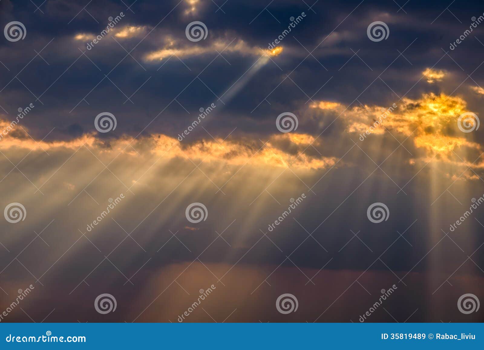 sunrays between the clouds