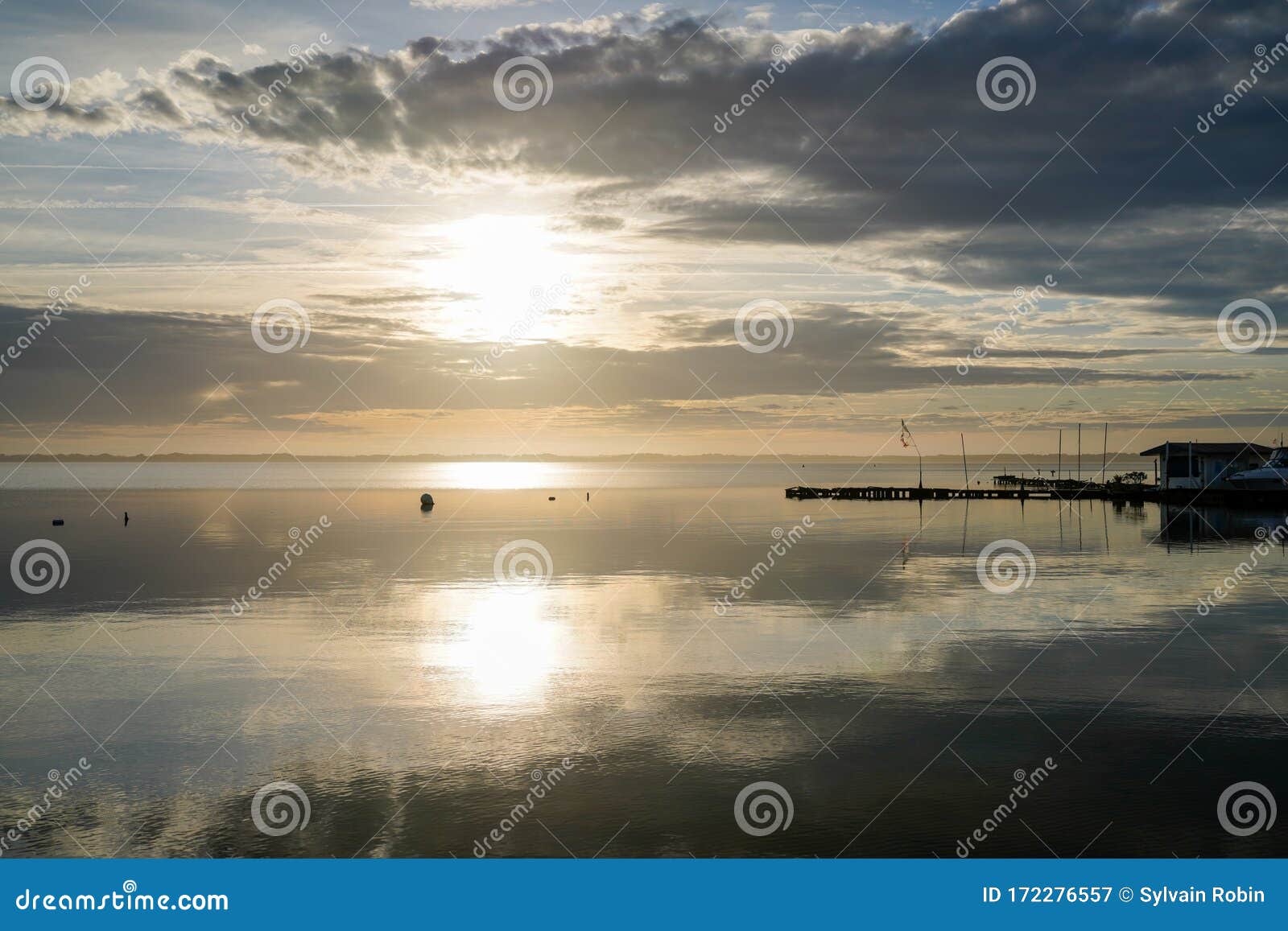 sunrise biscarrosse pontoon pier in sunny sunset in lake