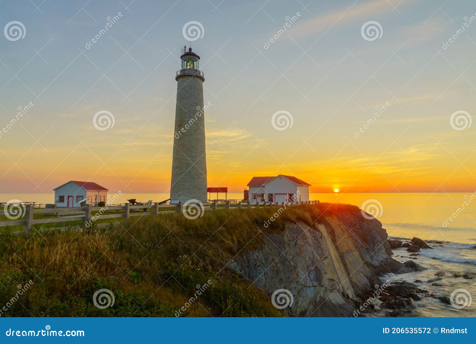 sunrise in the cap-des-rosiers lighthouse