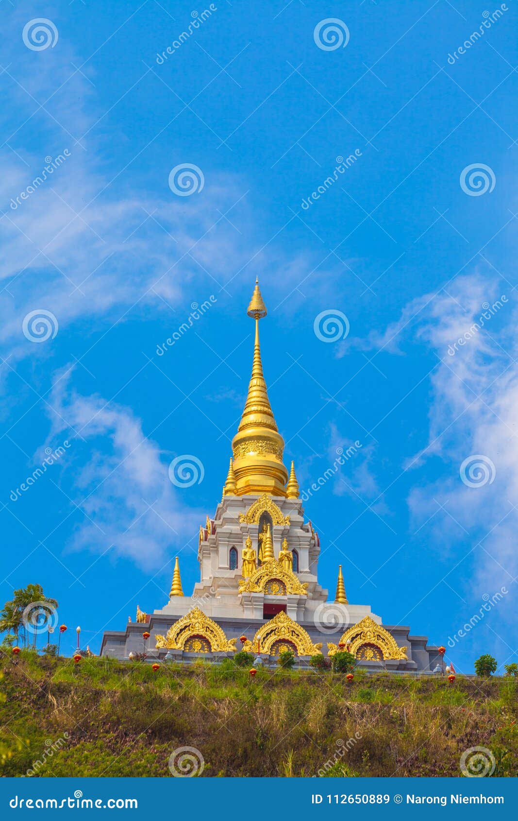 sunrise in front of pagoda at wat santikhiri temple in mae salong