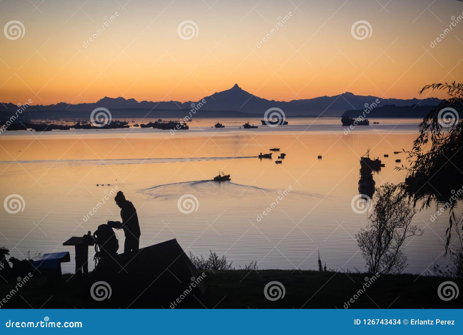sunrise in the harbour of quellon in chiloe island. patagonia in