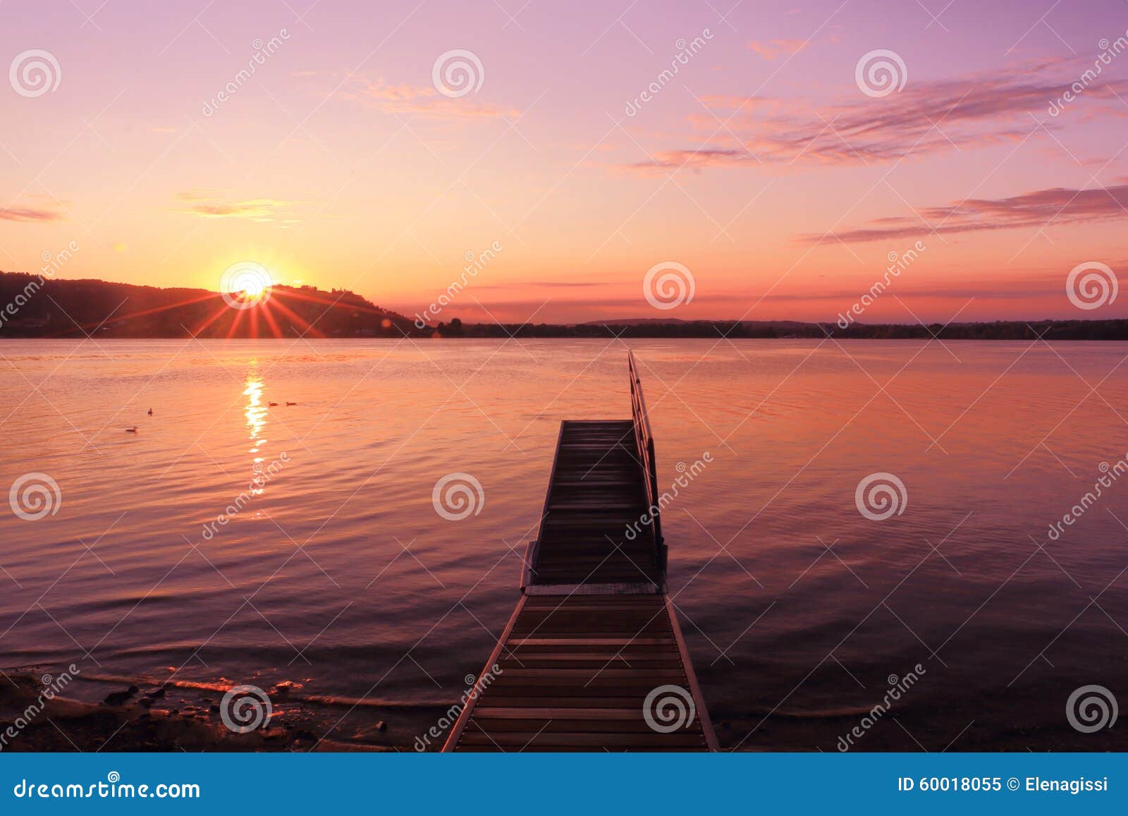 sunrise by a lake inspiring relax and quietness