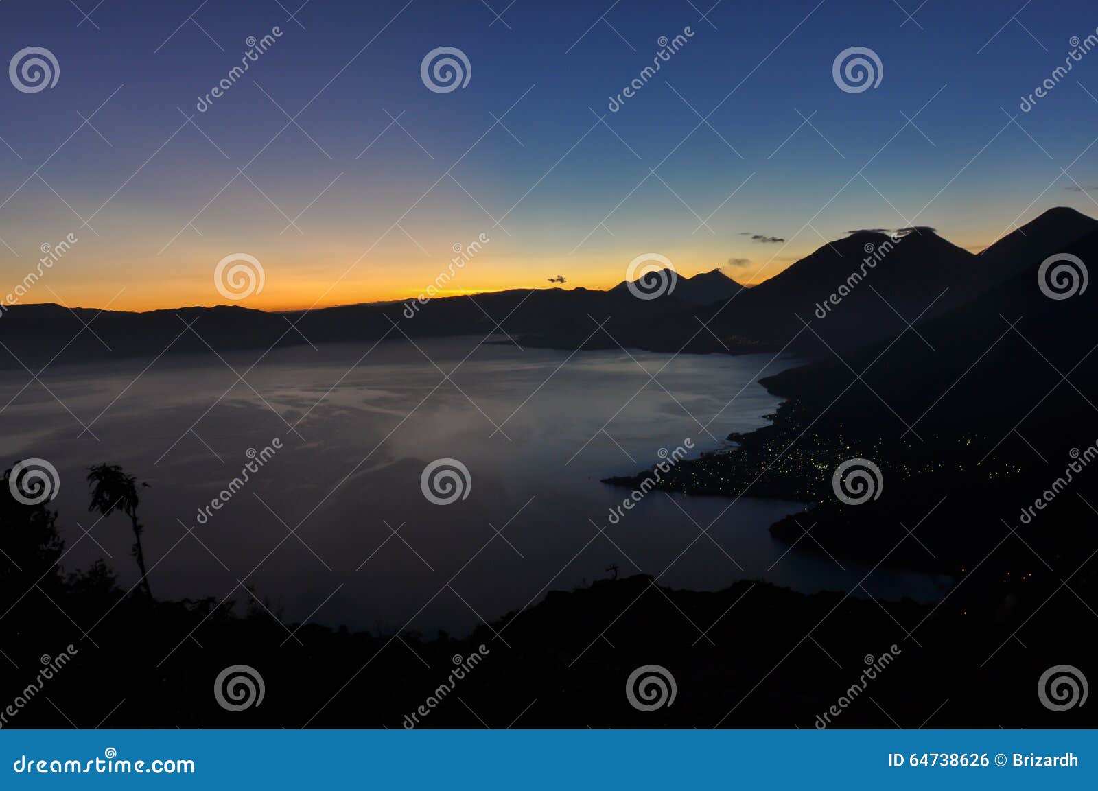 sunrise from narriz del indio over lago atitlan, guatemala
