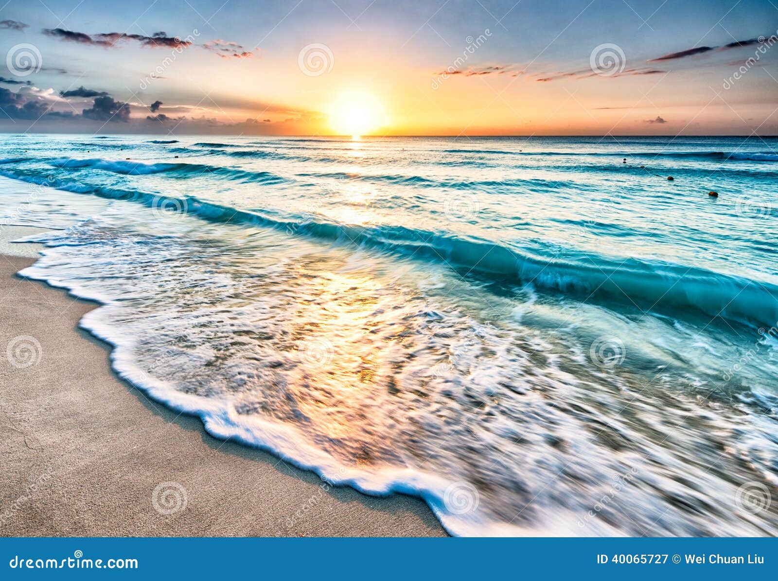 sunrise over beach in cancun