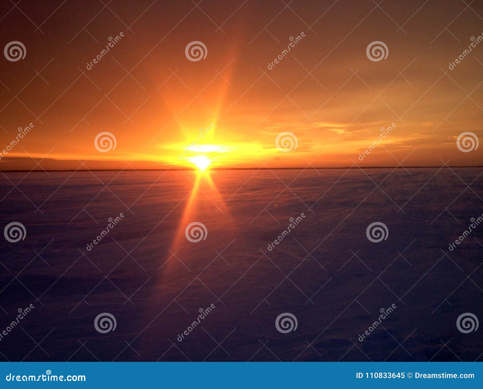 sunrise over the winter desert in the vologda region, the volga-baltic canal