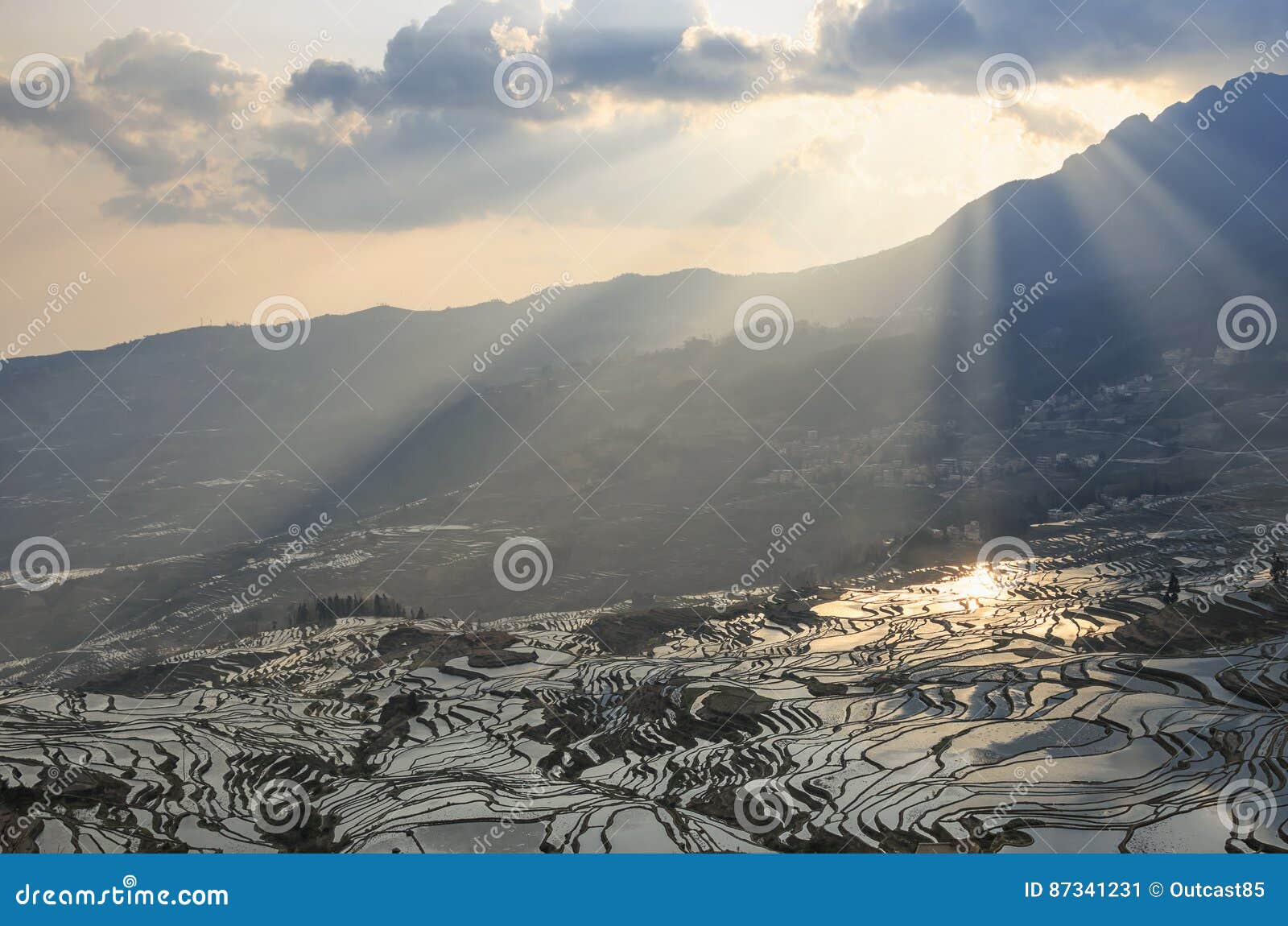 sunrise over yuanyang rice terraces in yunnan, china, one of the latest unesco world heritage sites