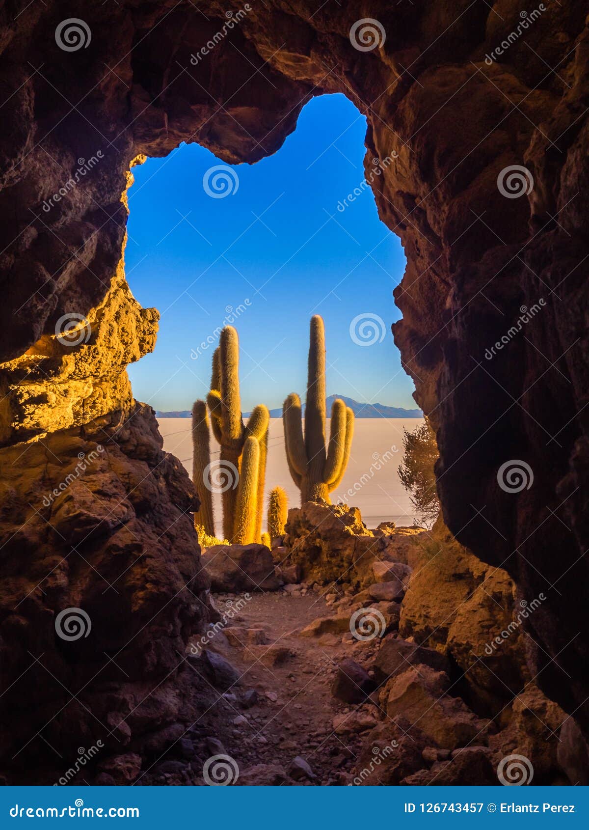 sunrise on the salt flat of uyuni inside a cave