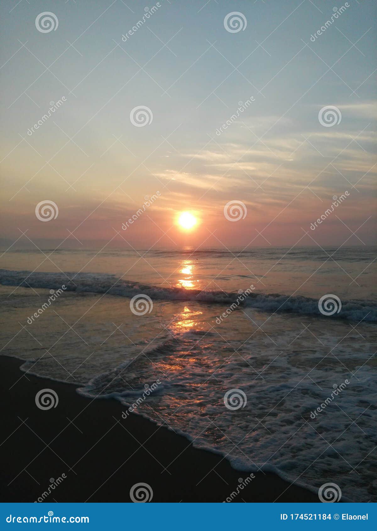 Sunrise At Seashore With Orange Clouds And Waves Stock Photo Image Of