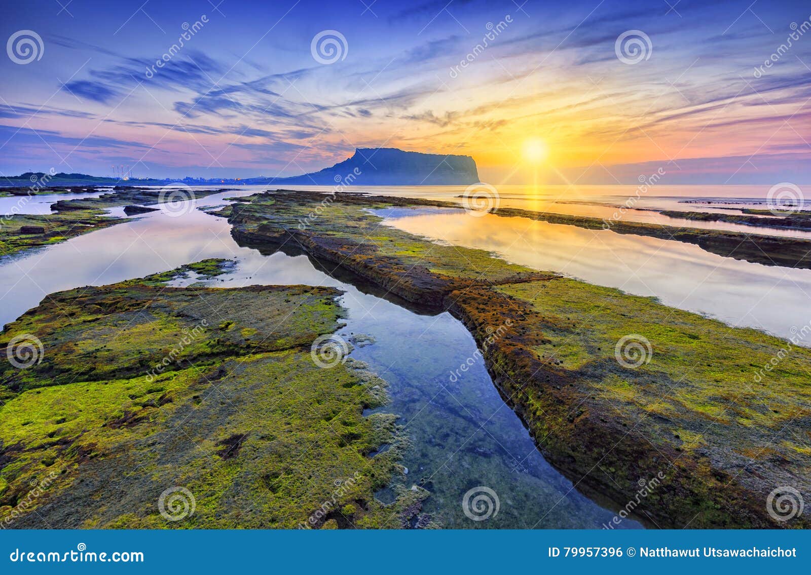 sunrise at seongsan ilchulbong, jeju island, south korea.