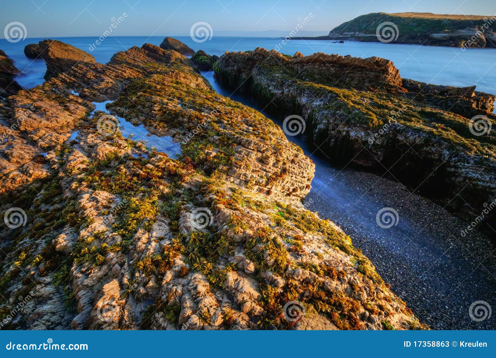 Sunrise on Spooners Cove stock image. Image of rock, green 17358863