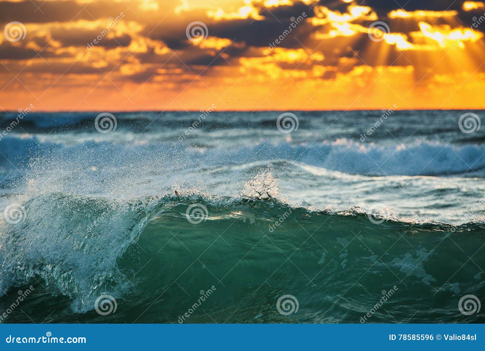 sunrise wave. ocean waves crashing onto the shore