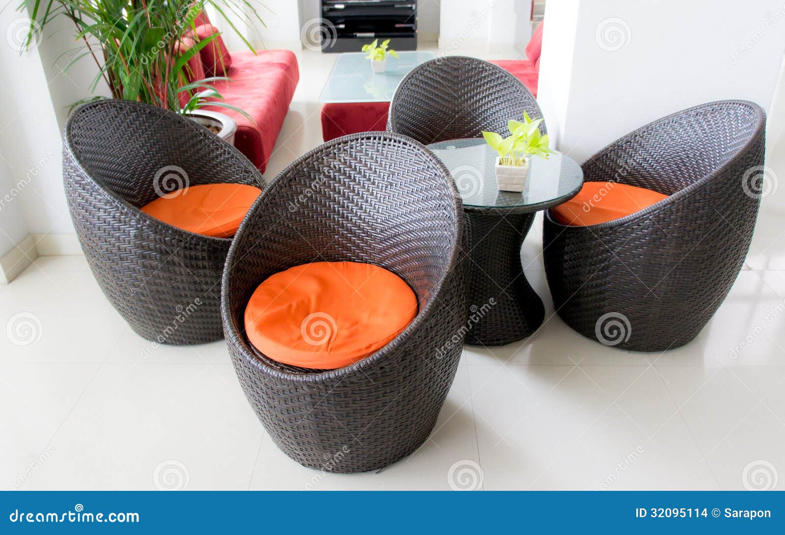 Sunroom In Luxury Home With Wicker Furniture Stock Photo Image