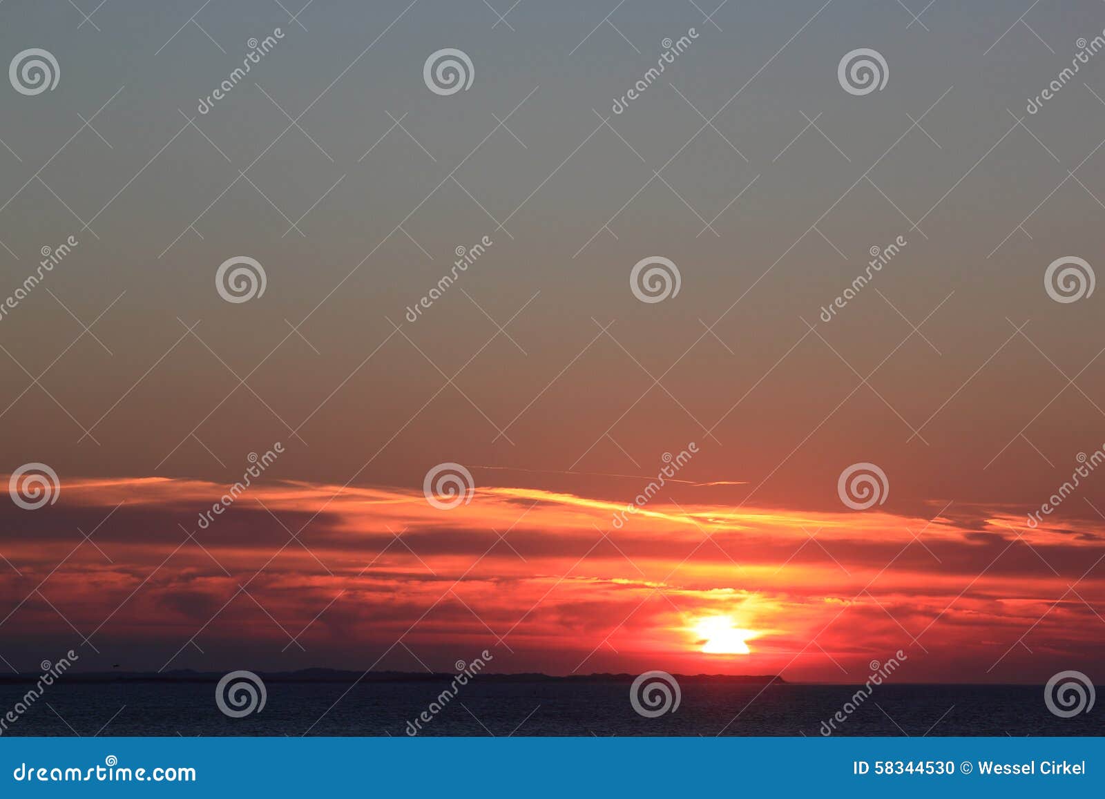 sunset at ameland island, the netherlands