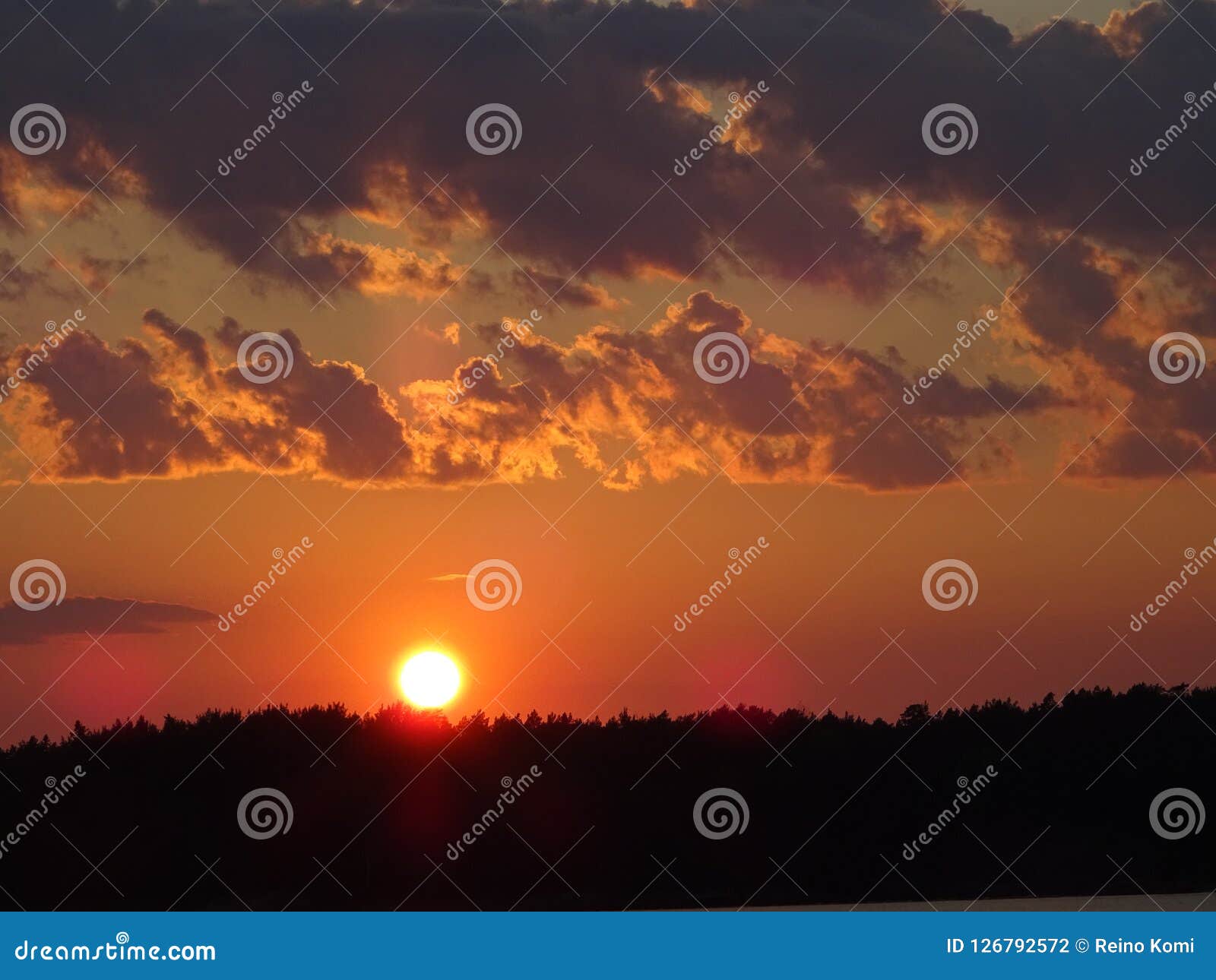 a sunset in archipelago by the gulf of finland