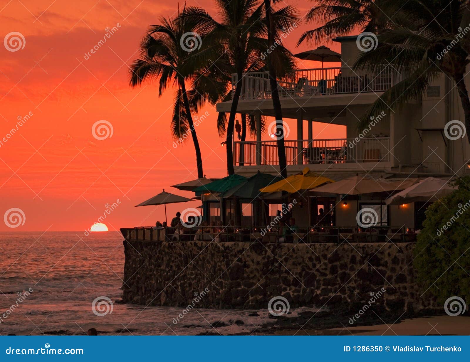 Sunset at the beach, cafe stock photo. Image of beach 1286350