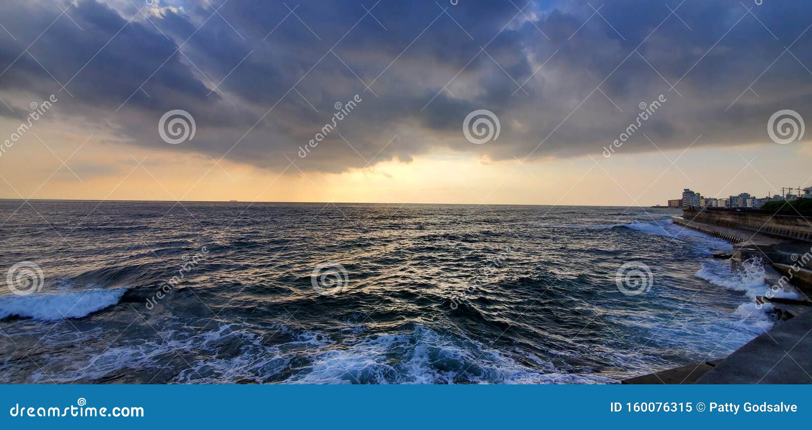 Sunset Beach in Okinawa Japan with Rocky Shore and Cloudy Skies Stock ...