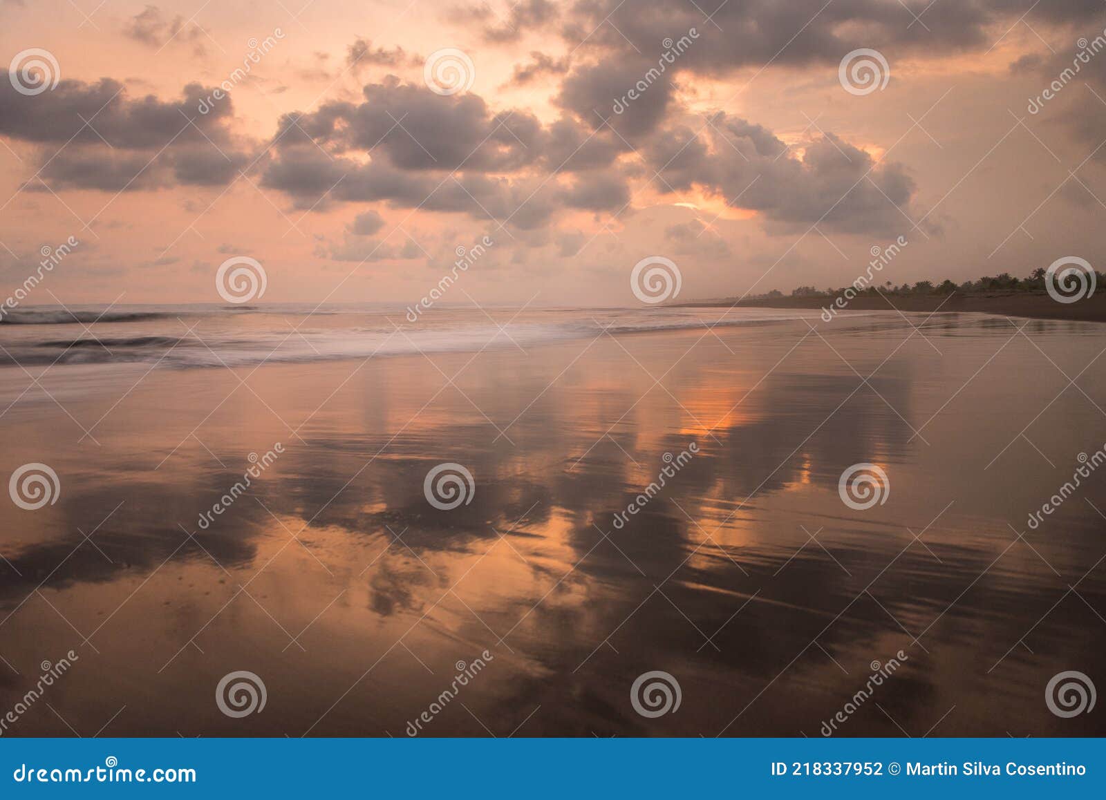 sunset on the beaches of pandagaran in java, indonesia