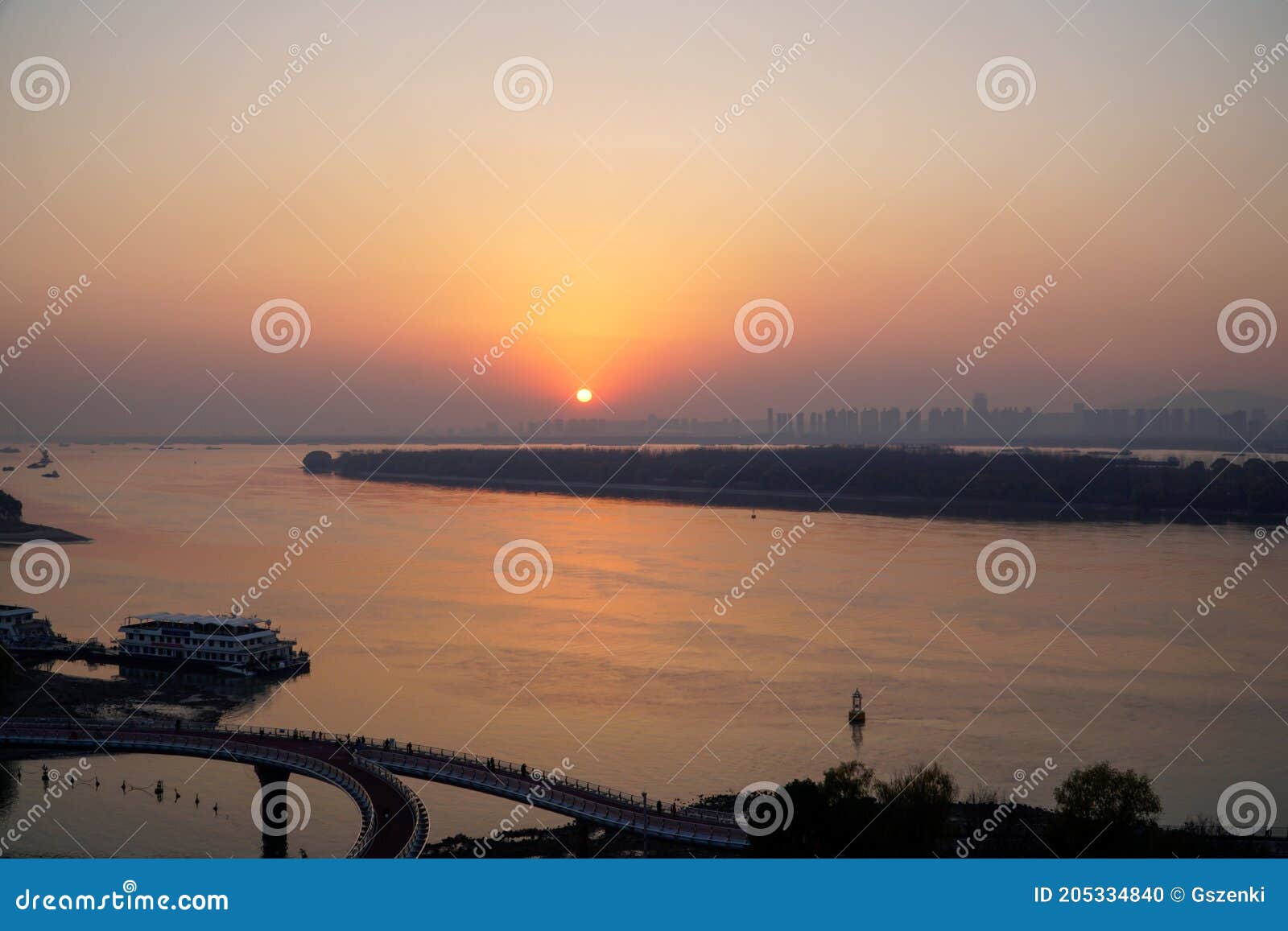 sunset of changjiang river side, nanjing city, china.
