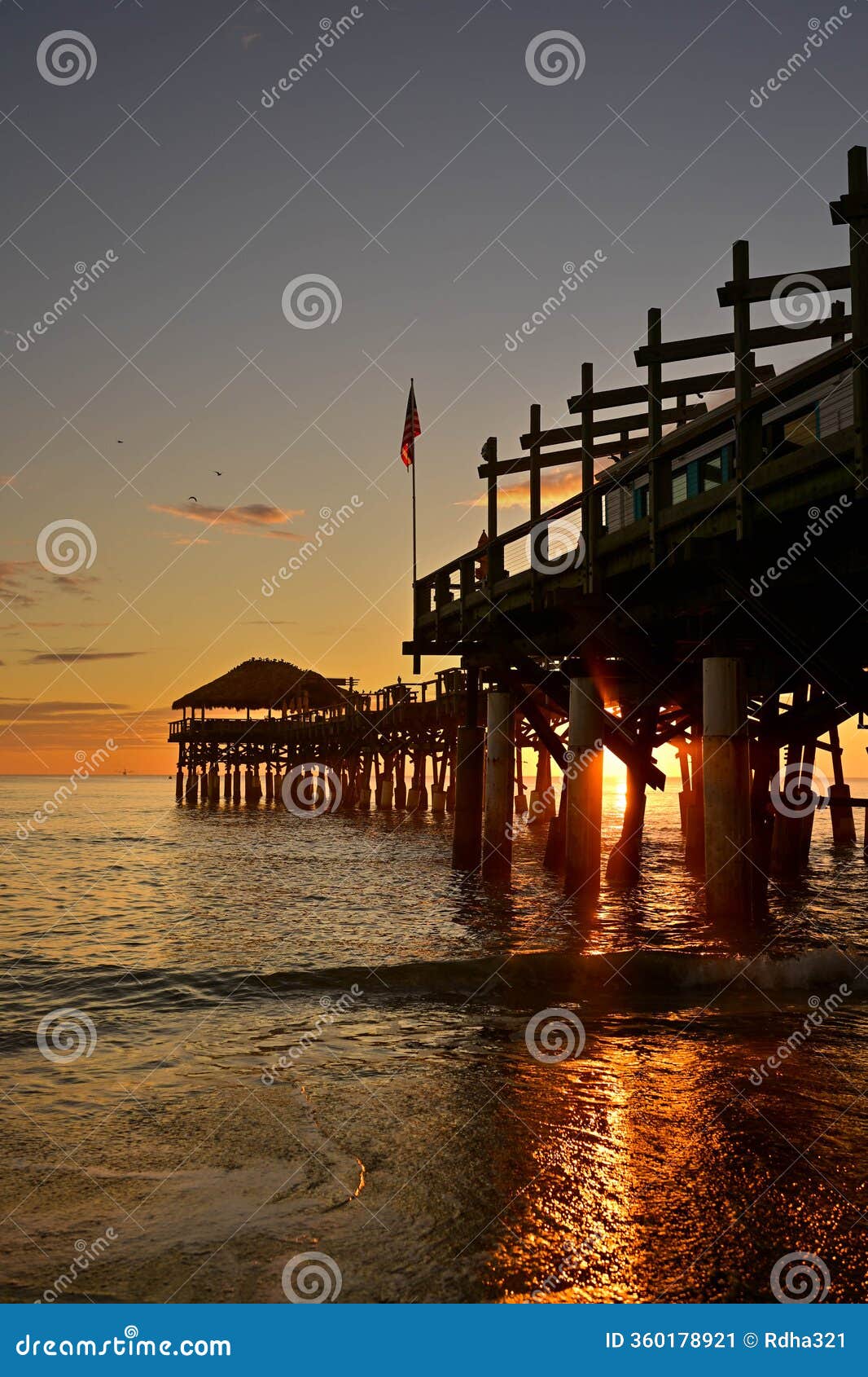 Sunset at Cocoa Beach Pier, Florida Stock Image - Image of clouds, pier:  360178921, image size:1066x1690