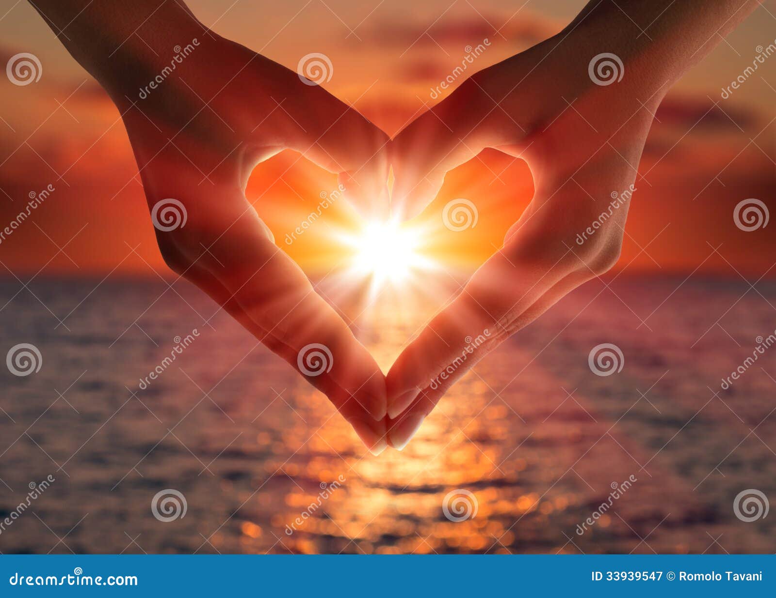 sunset in heart hands