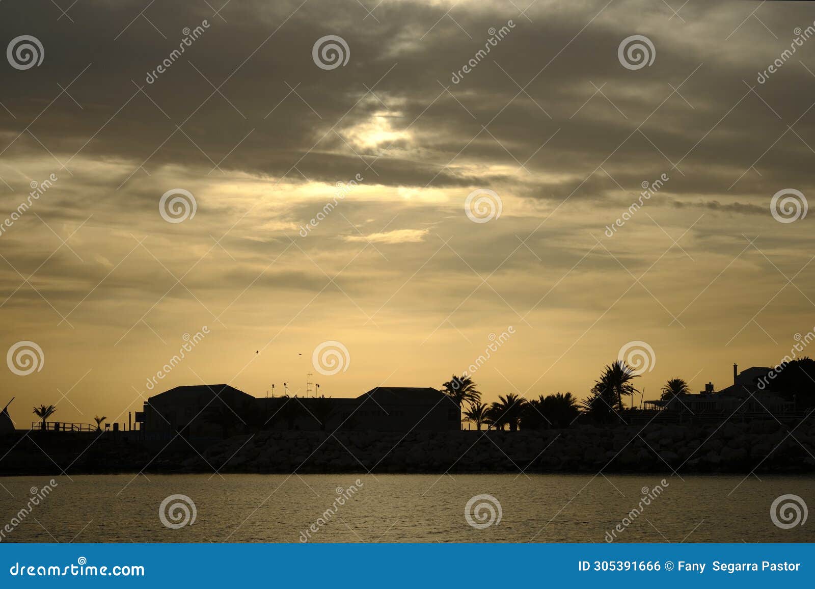 the sunset on the island of tabarca, on a winter sunset