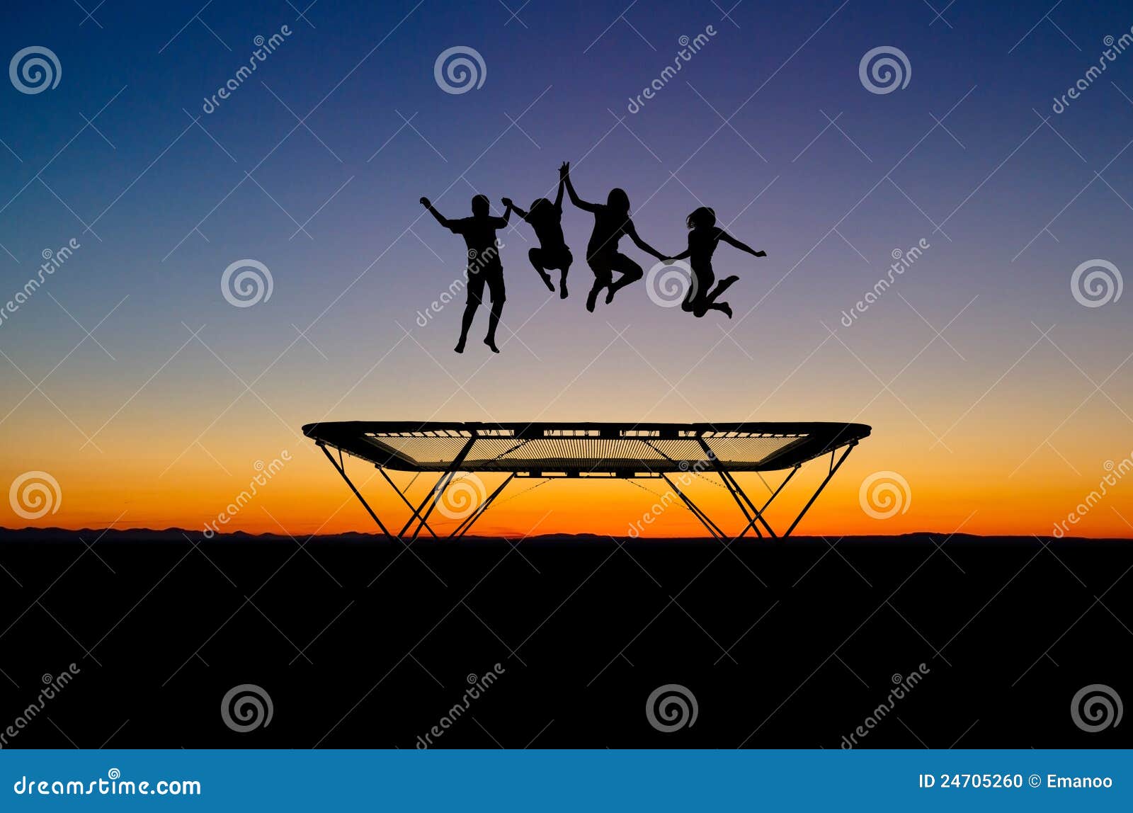 sunset kids on trampoline