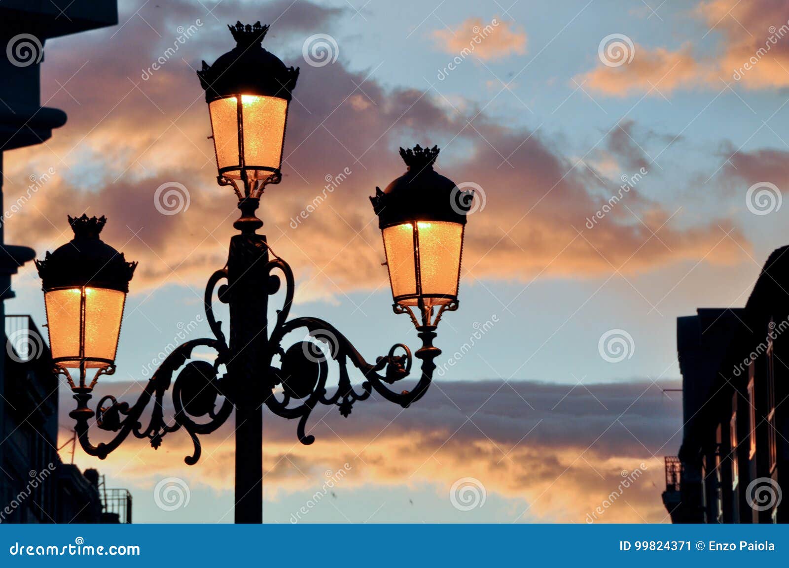 Sunset with lamppost stock image. Image of plaza, concept 99824371