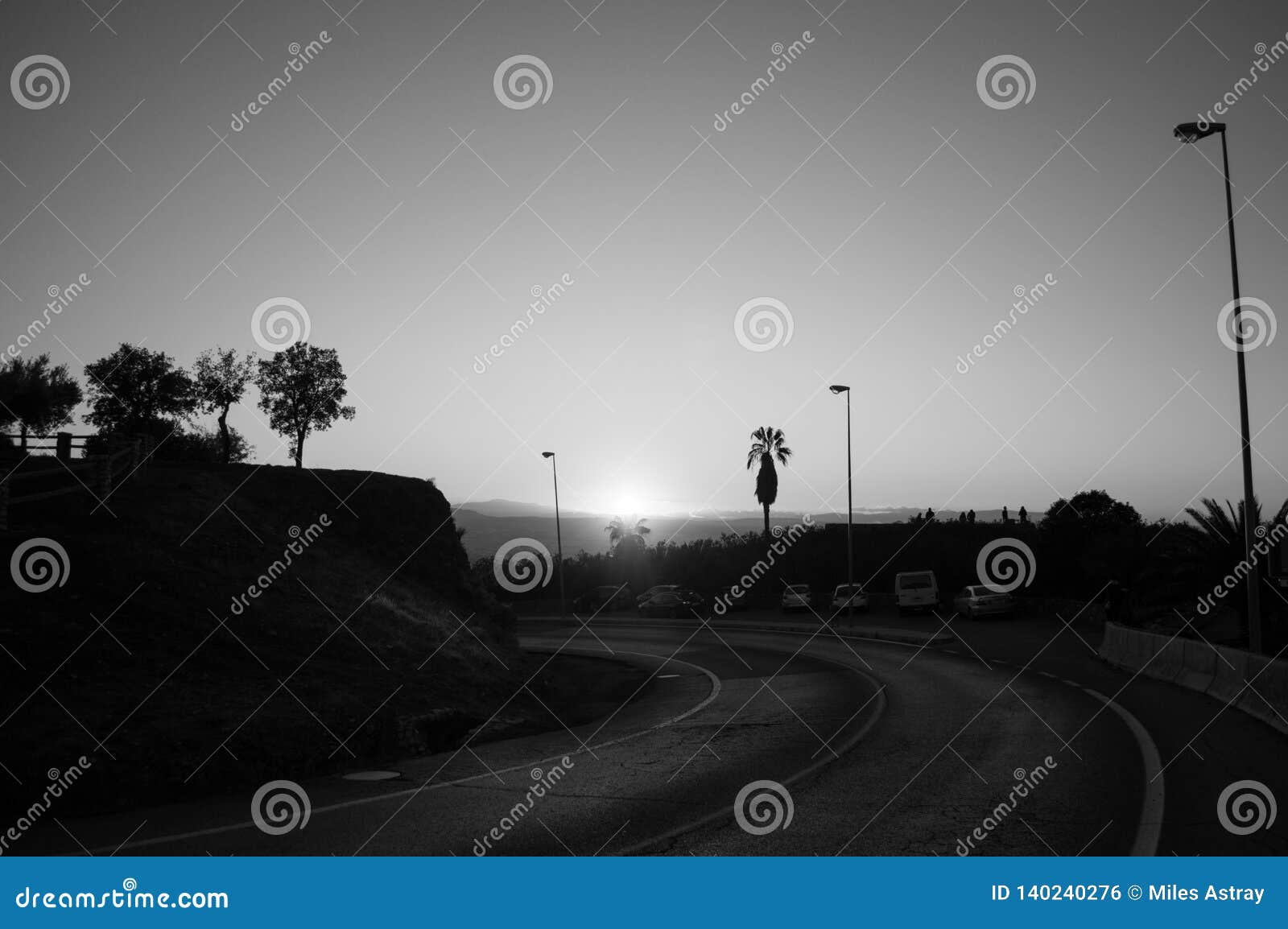 sunset at mirador del barranco del abogado lookout in granada, spain