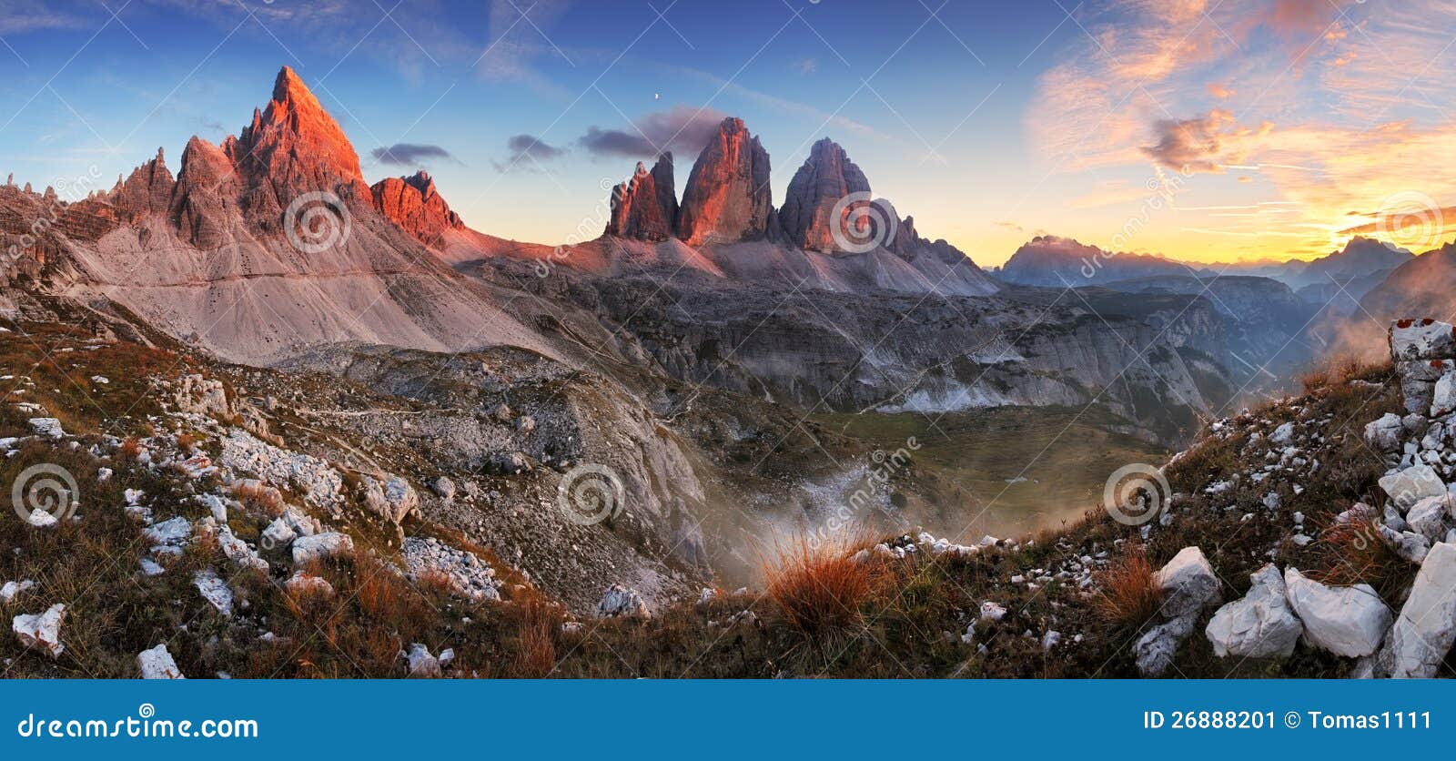 sunset mountain panorama in dolomites - tre cime