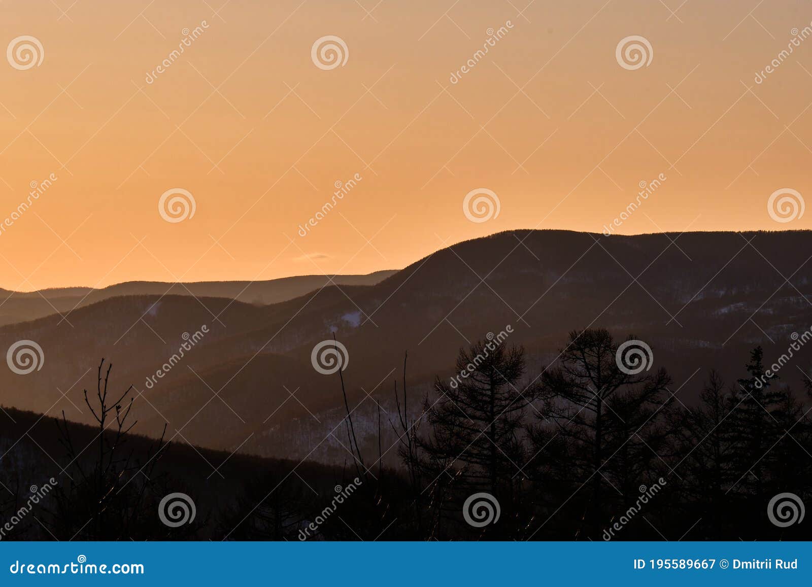 sunset among the mountains on the road lidoga-vanino khabarovsk territory.