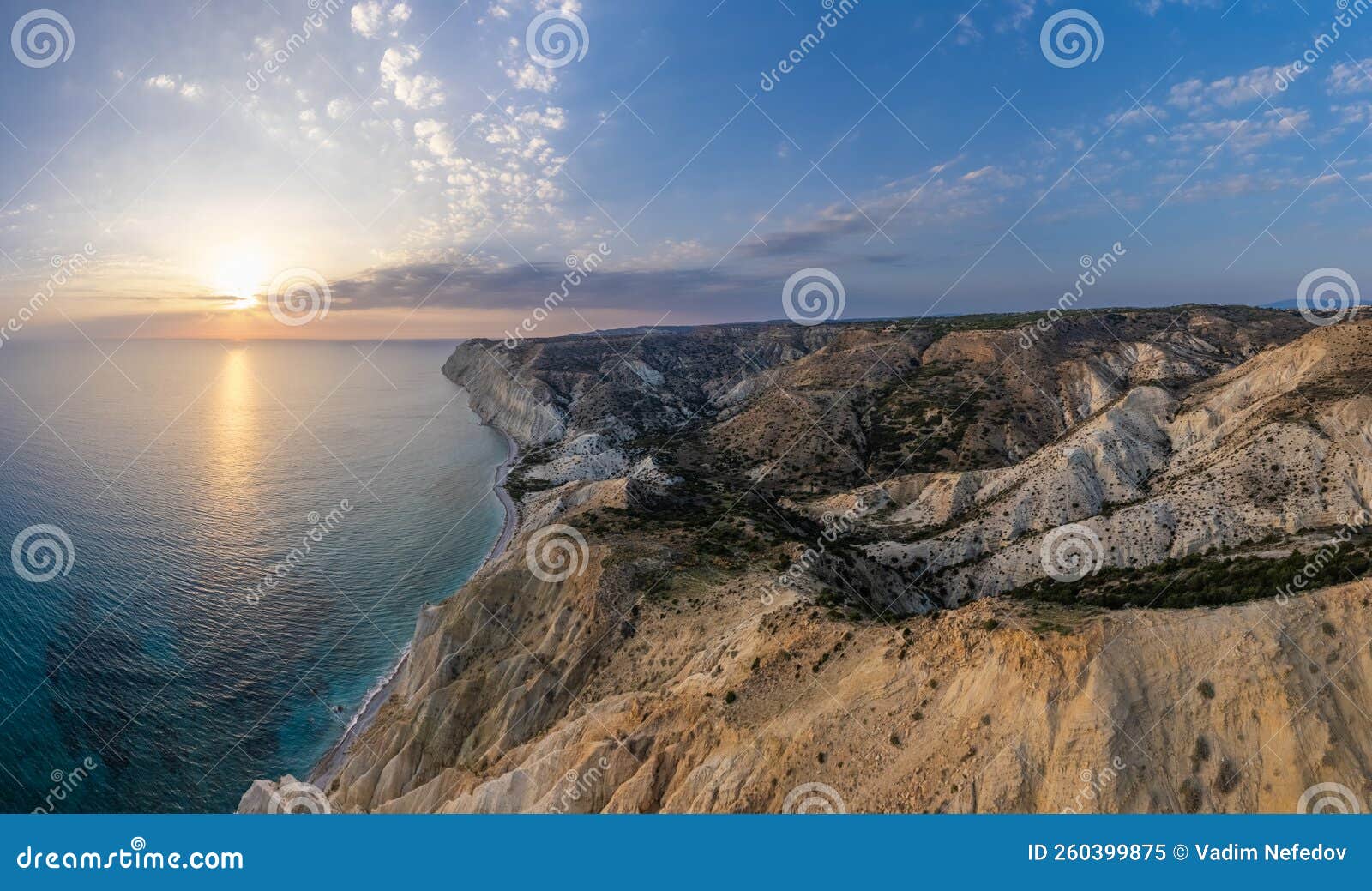 sunset near cape aspro cliffs aerial panorama from drone, limassol