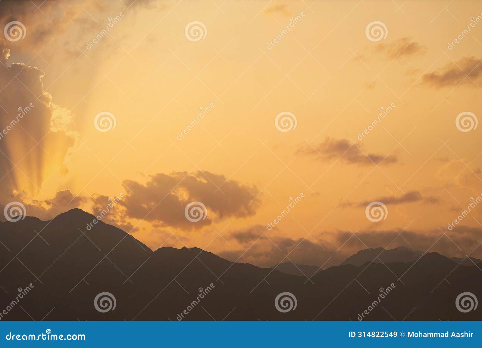 sunset at the northern spanish region of leon's riaÃ±o peak, surrounded by snow-capped mountains and forests.