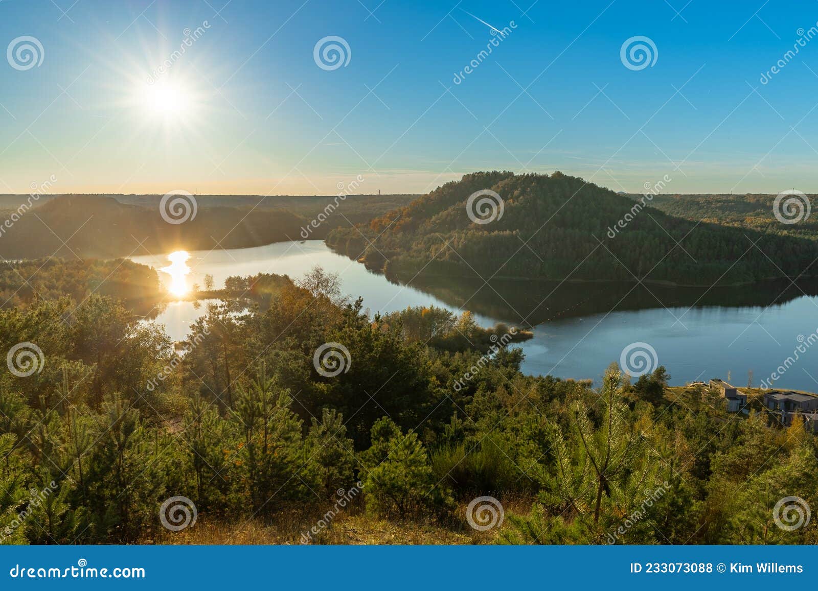 sunset over the hills of a former coal mine near the belgium city of maasmechelen. this area has been reed into an amazing n