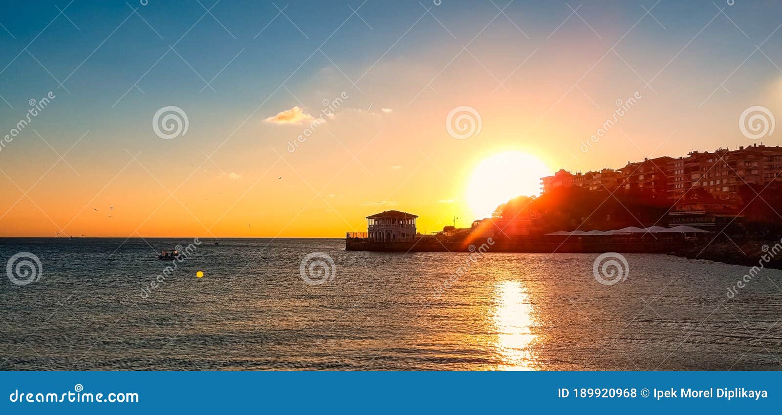 sunset over the historical moda pier in istanbul, turkey