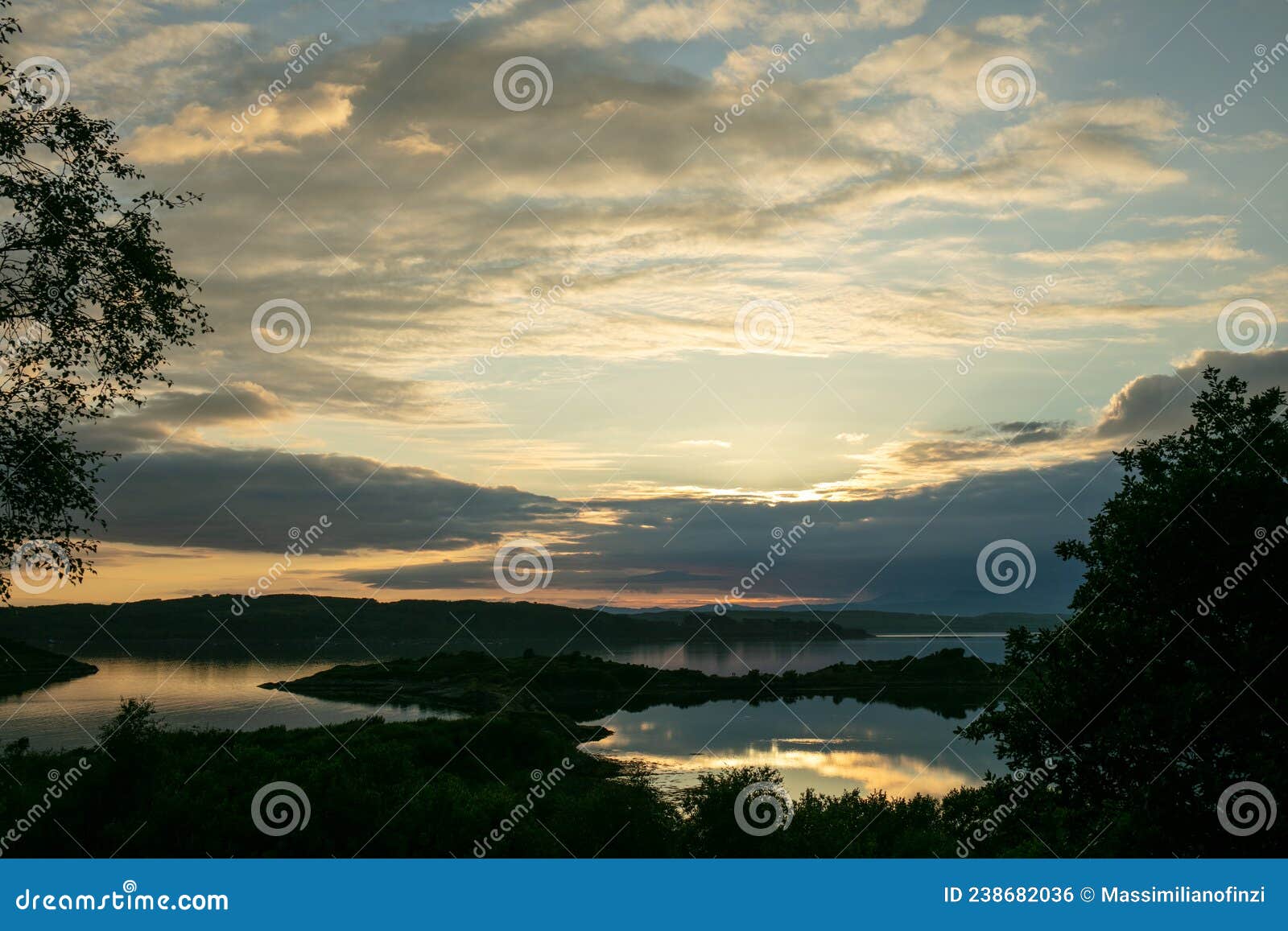 cloudy sunset over the loch shuna in scotland.